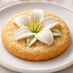 découvrez notre cookie à la fleur de lys blanche, alliant douceur et élégance pour une expérience gustative unique et raffinée.