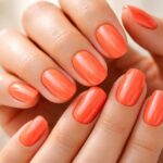 découvrez la tendance orange corail pour des ongles éclatants et frais. sublimez vos mains avec une couleur idéale pour apporter lumière et vitalité à votre look.